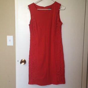 Red knit dress with the lace side panels